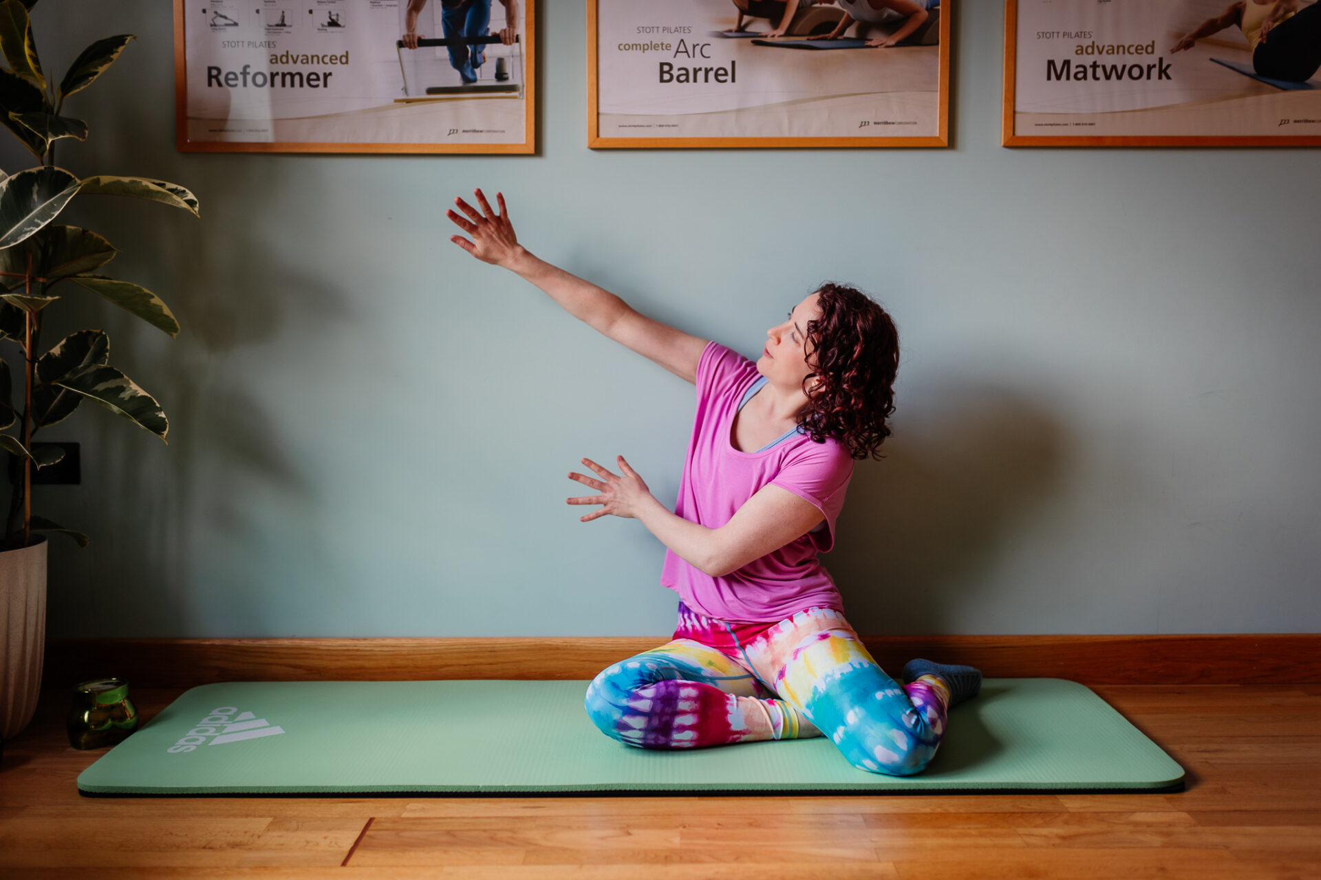 Emmeline teaching Wall Pilates in the Green Room Health Studio